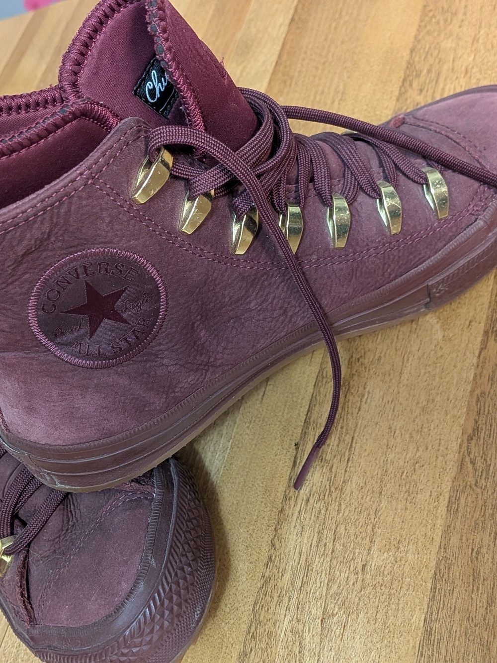 Converse Women's Burgundy High-Top Sneakers with Gold Eyelets